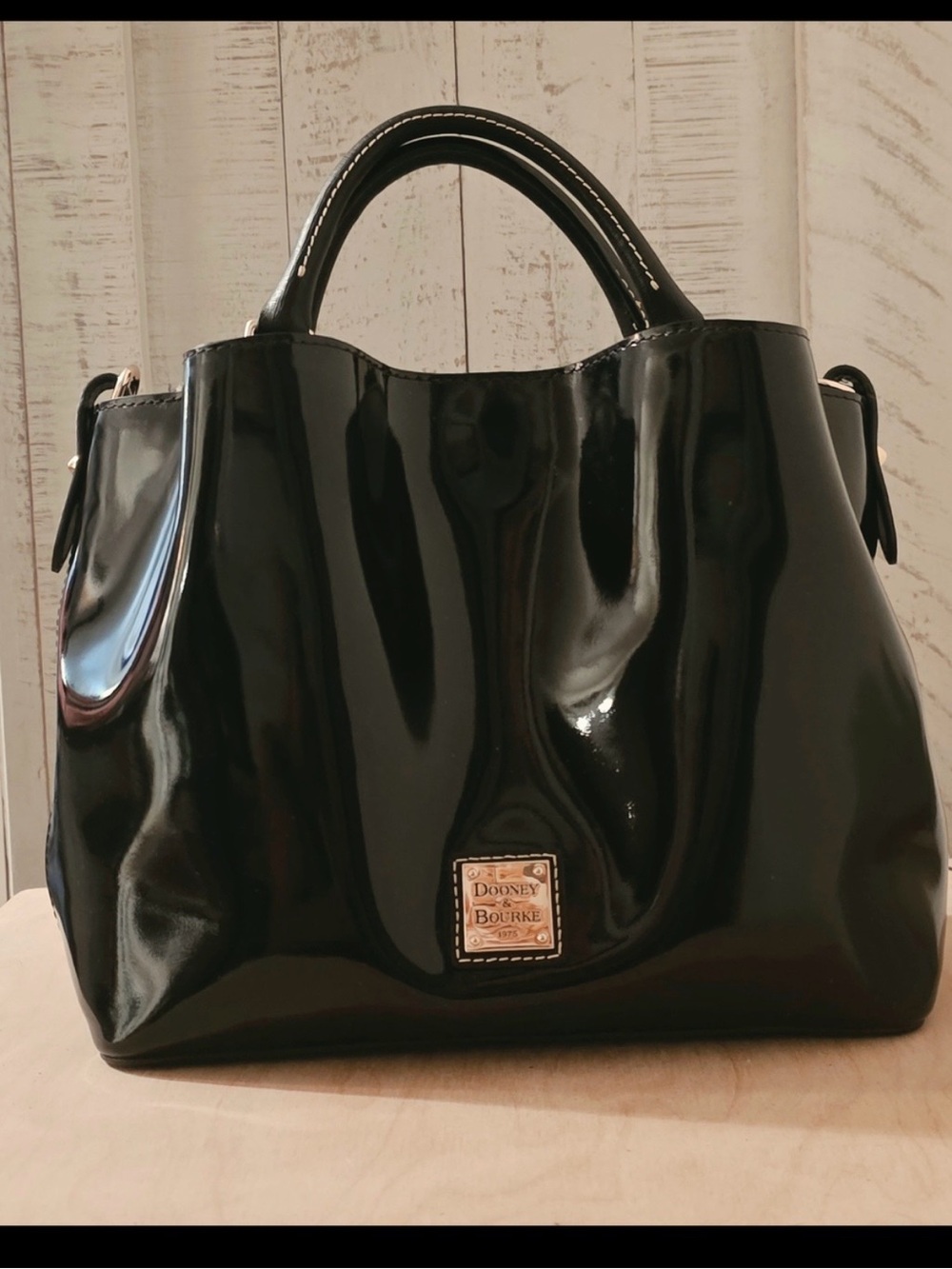 Dooney & Bourke medium size Black Patent Satchel with Crossbody Strap